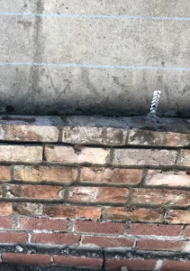 Brick wall - support bracket