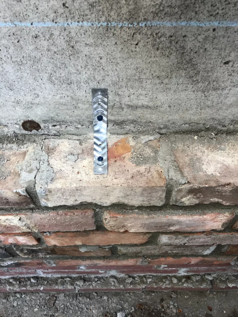 brick wall - support bracket